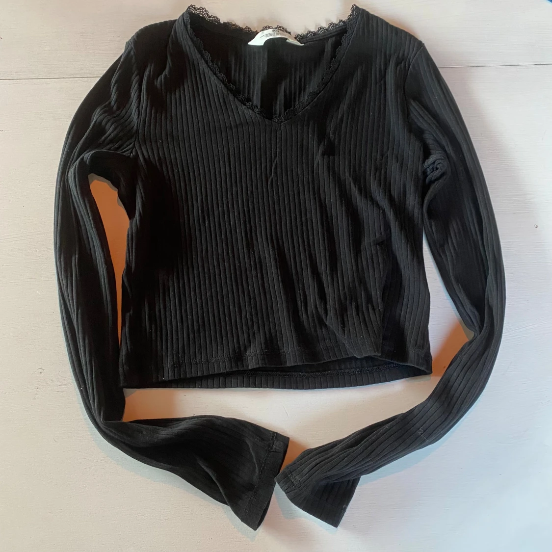 Svart ribbad långärmad topp - 1