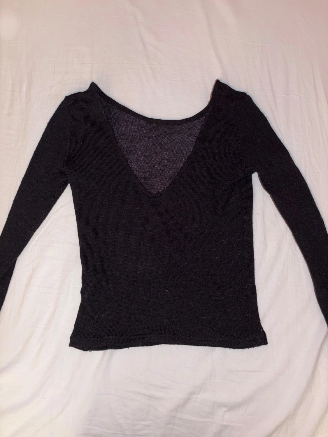 Svart ribbad långärmad topp