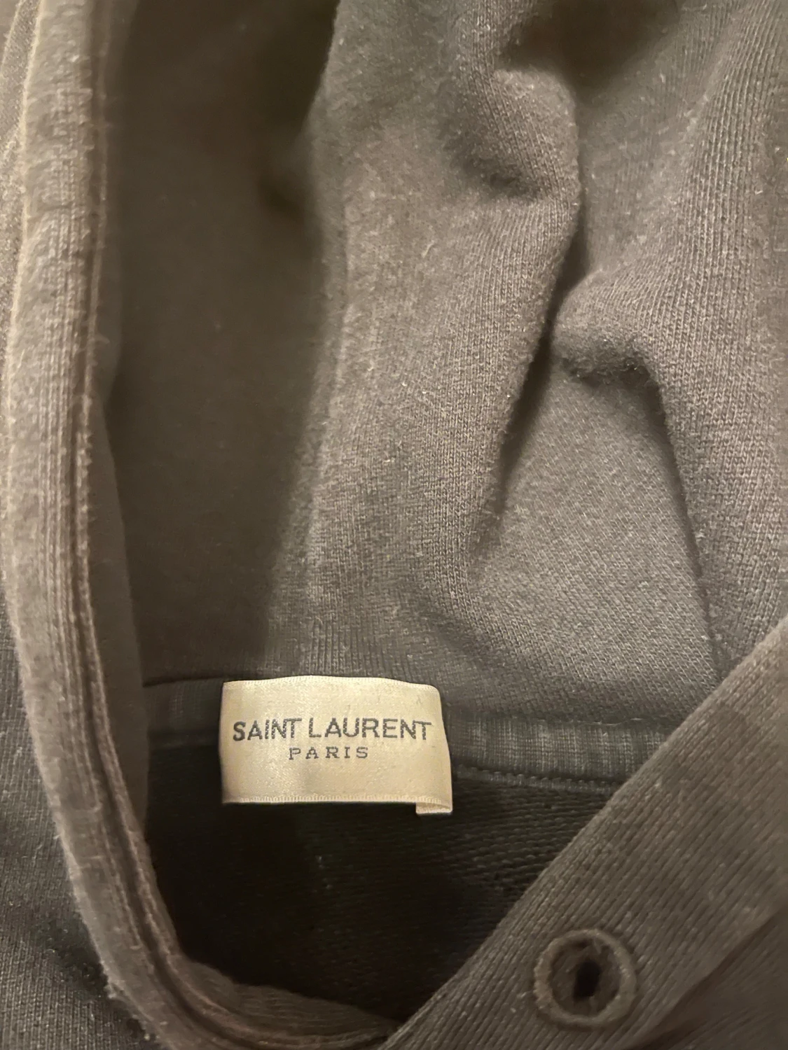 Svart saint Lauren hoodie med vit text - 1