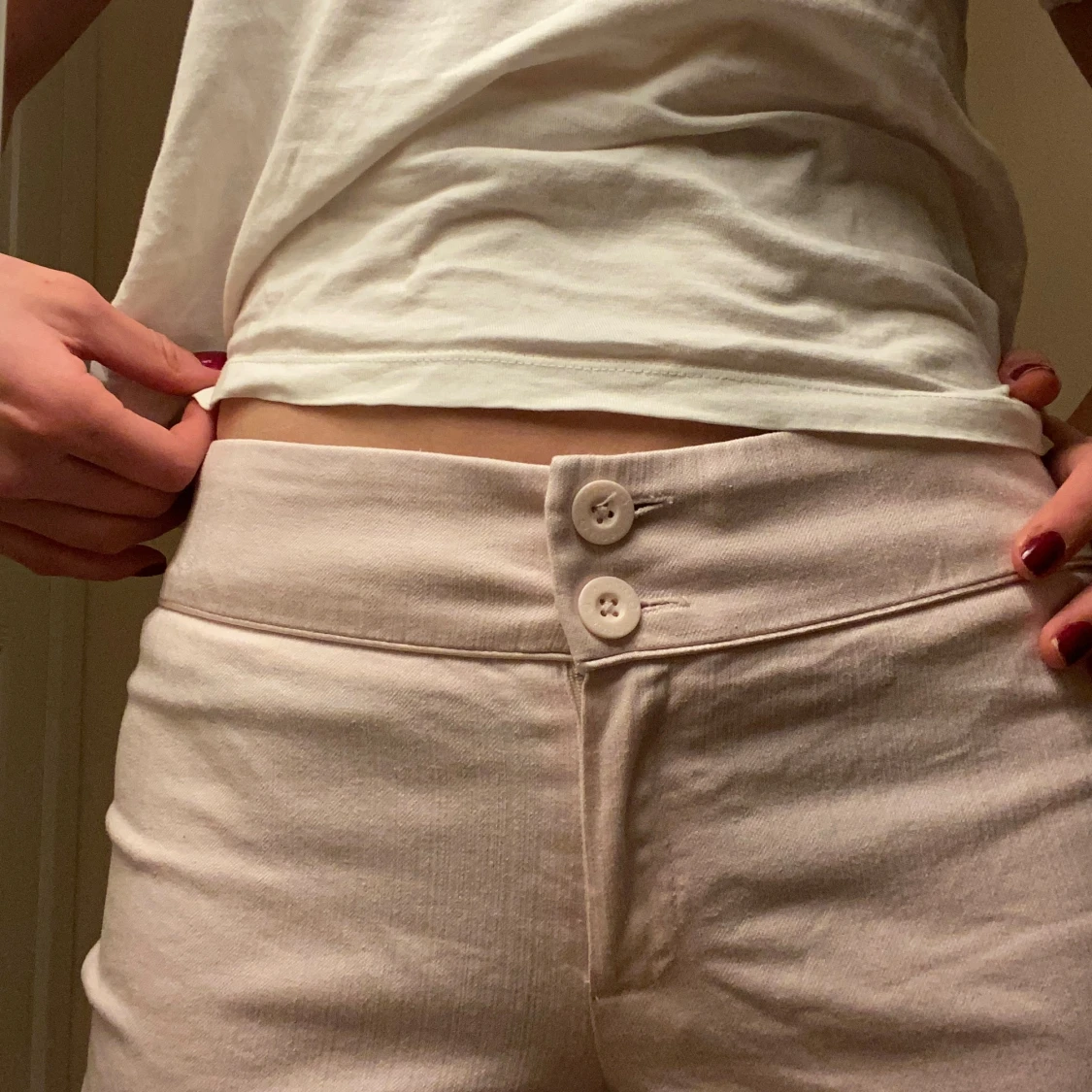 Ljusrosa bootcut byxor med spets