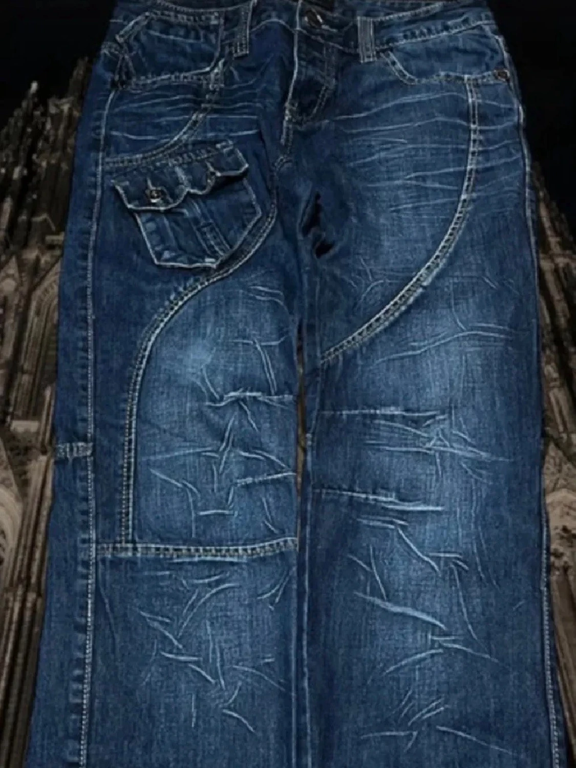 Blå baggy jeans med fickdetaljer