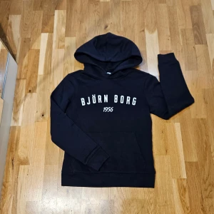 Björn Borg hoodie  - En helt ny marinblå Björn Borg hoodie i storlek XS