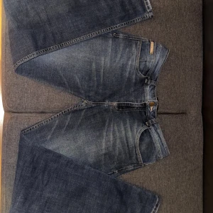 jeans från Big John, storlek 32 - Säljer ett par klassiska blå jeans från Big John i storlek 32. 