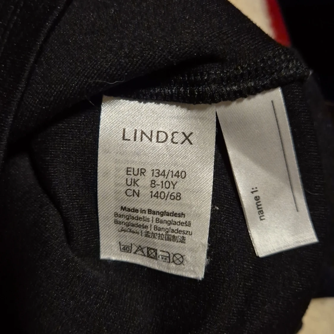 Svart långärmad topp med volang Lindex - 3