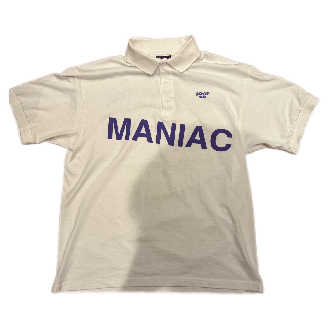 Vit polo från Soap08 med tryck