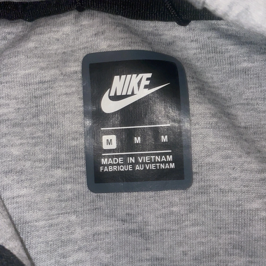 Grå vindjacka från Nike med huva - 3