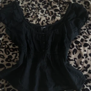 Babydoll top från H&M - Jättefin svart babydoll top från H&M! 