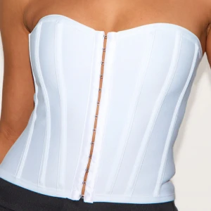 Korsett topp - Supersnygg vit korsett topp från PLT. Helt oanvänd med prislappar kvar! 