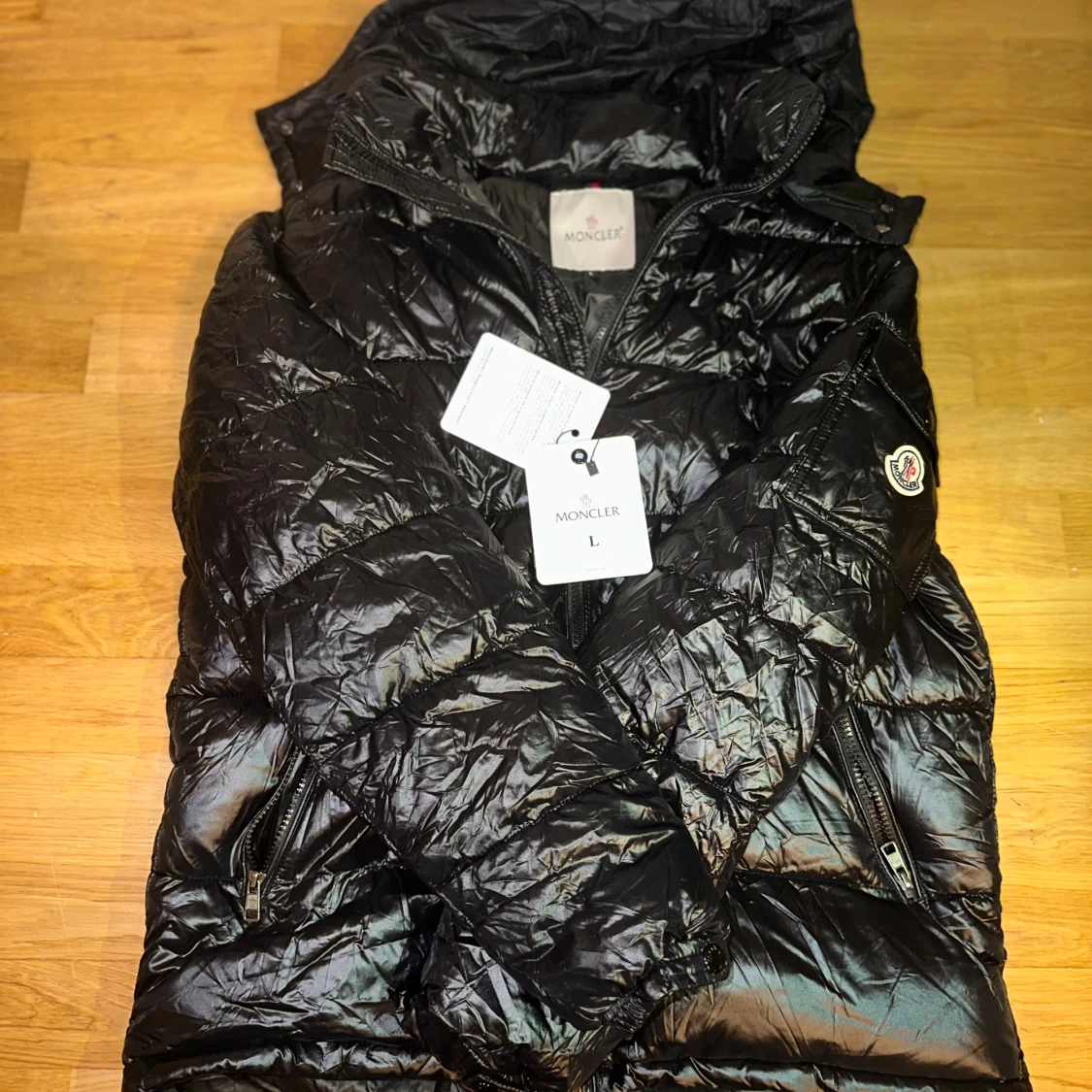 Svart Moncler pufferjacka L