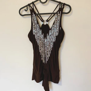 vintage paljett-topp - Vintage paljett-topp som är helt ny med lappen på. Stretchig så passar många & blir figur-passande. Helt ny med lappen på. Storleken är S/M.