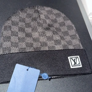 Rutig mössa  - En fin rutig mössa som håller dig varm samt stilig på en kall vinter dag 