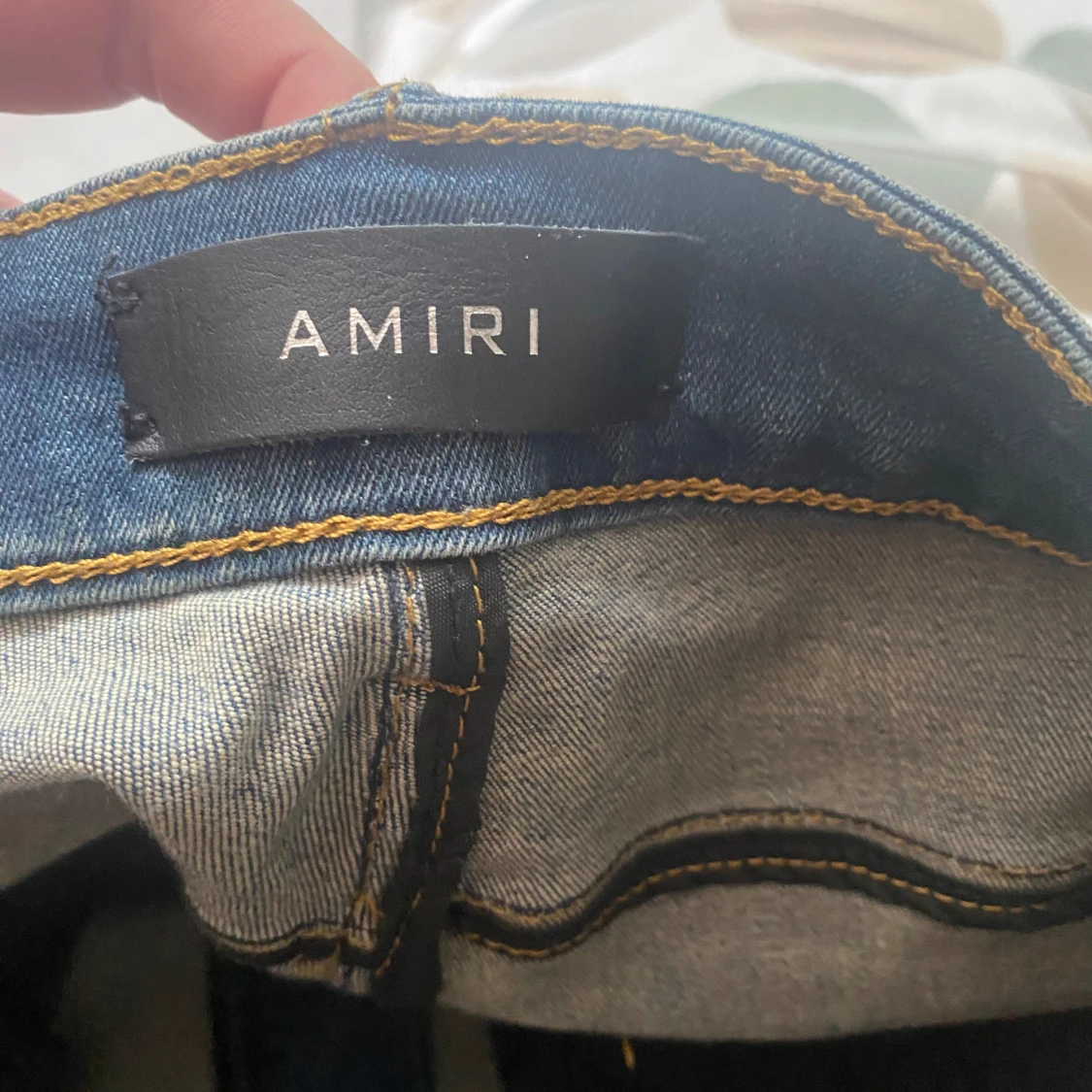 Amiri slitna jeans med patch-detaljer - 2