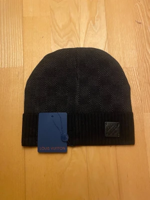 Svartrutig mössa  - En helt ny snygg mössa som är perfekt inför vintern!