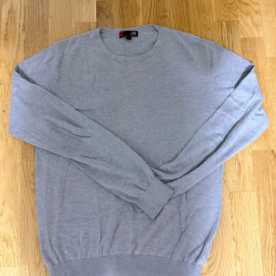 Grå långärmad tröja från Cotton Club