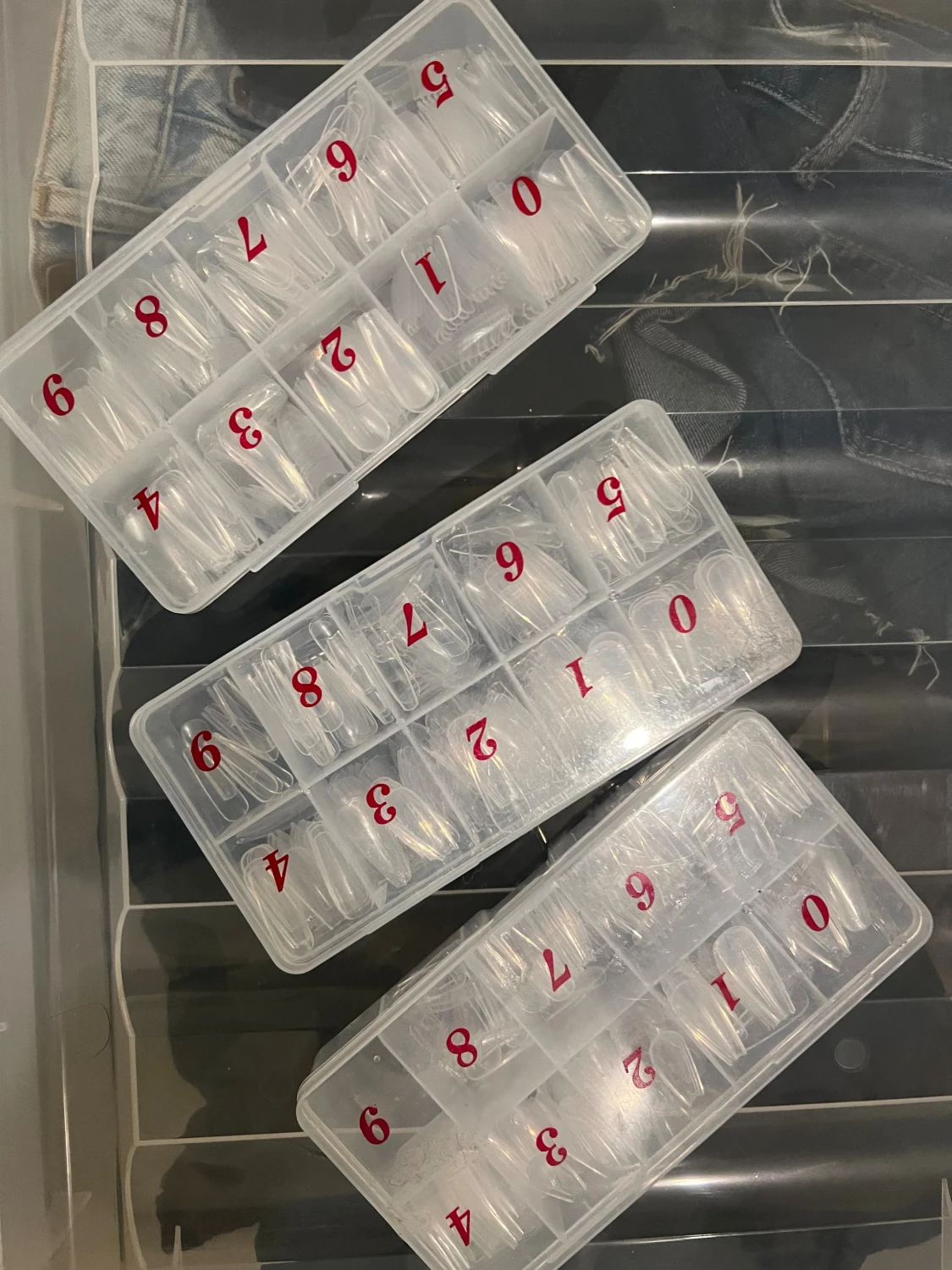 Falska nageltippar i olika storlekar