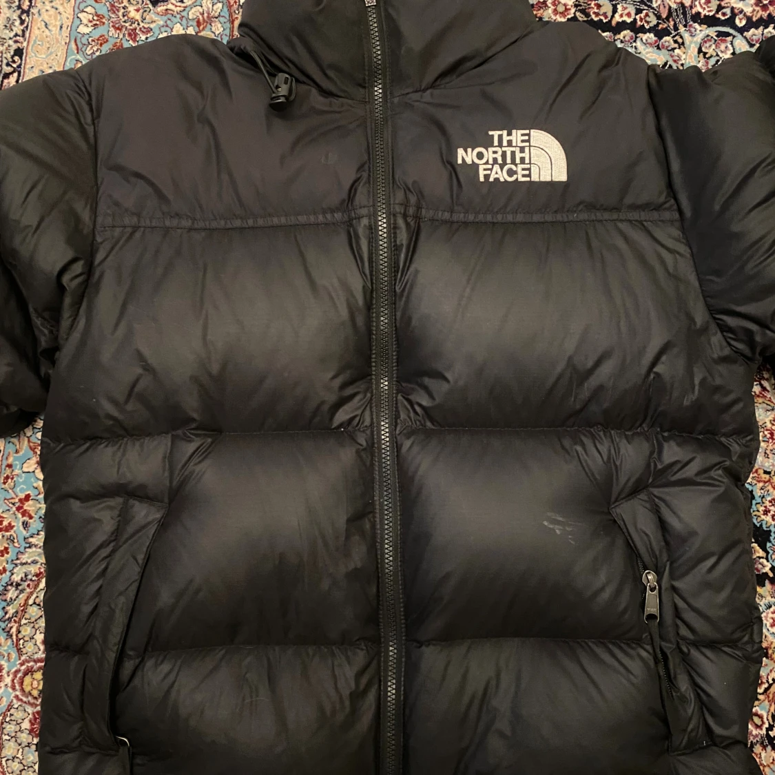 Svart dunjacka från The North Face S