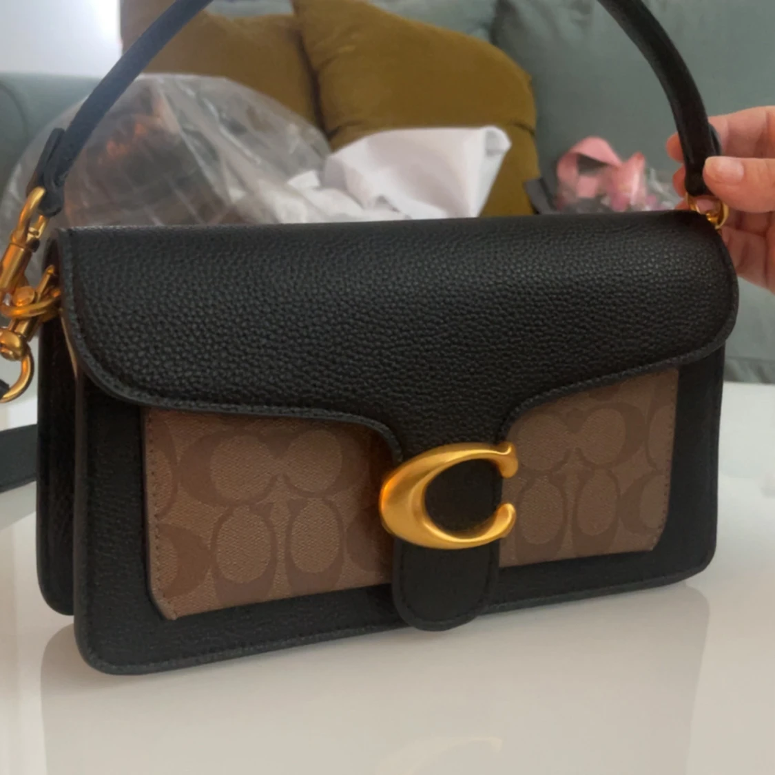 Coach axelväska i svart och brunt skinn