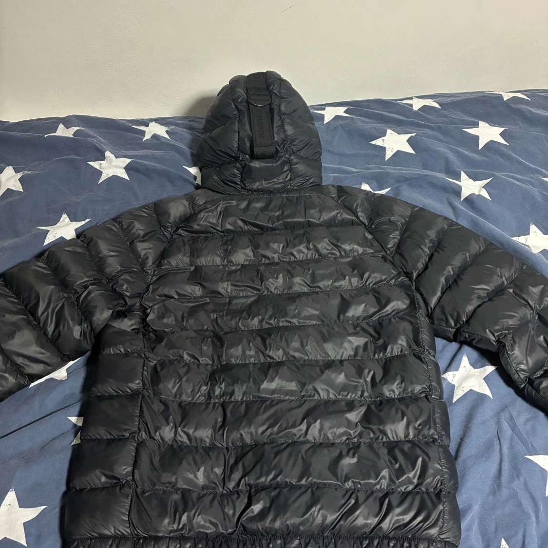 Svart dunjacka Peak Performance L - 1