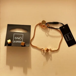 Snö of Sweden set - Örhängen och armband i roseguld. Helt oanvända med prislapp