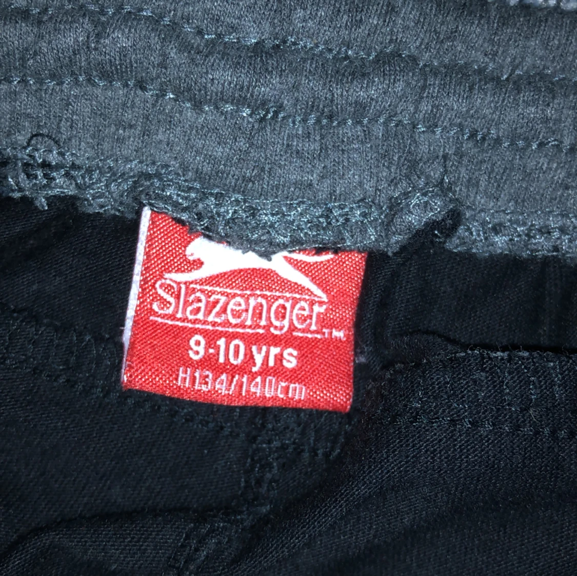  Ett par puma shorts och ett par slazenger shorts - 91