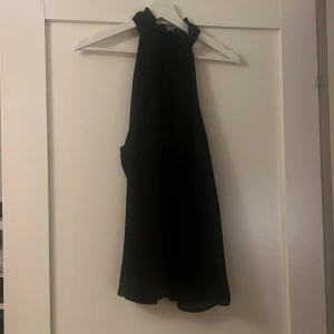 Halterneck topp - Kommer ej till användning 