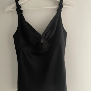 Snygg topp från Adoore - Aldrig använd, lappar kvar. Passade ej mig tyvärr!