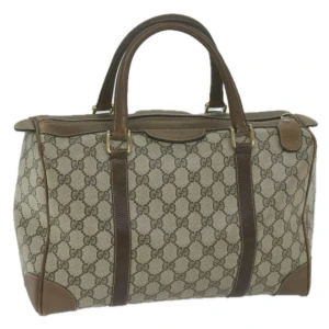 Gucci Supreme Boston väska - Gucci Supreme Boston-väska! Med en klassisk och tidlös design kommer denna väska att passa alla tillfällen. Perfekt för att lägga till en touch av lyxstil till vilken outfit som helst! Gott om plats för det mesta som dator och böcker!