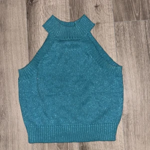 Glittrigt linne - Storlek xs men kan passa s 