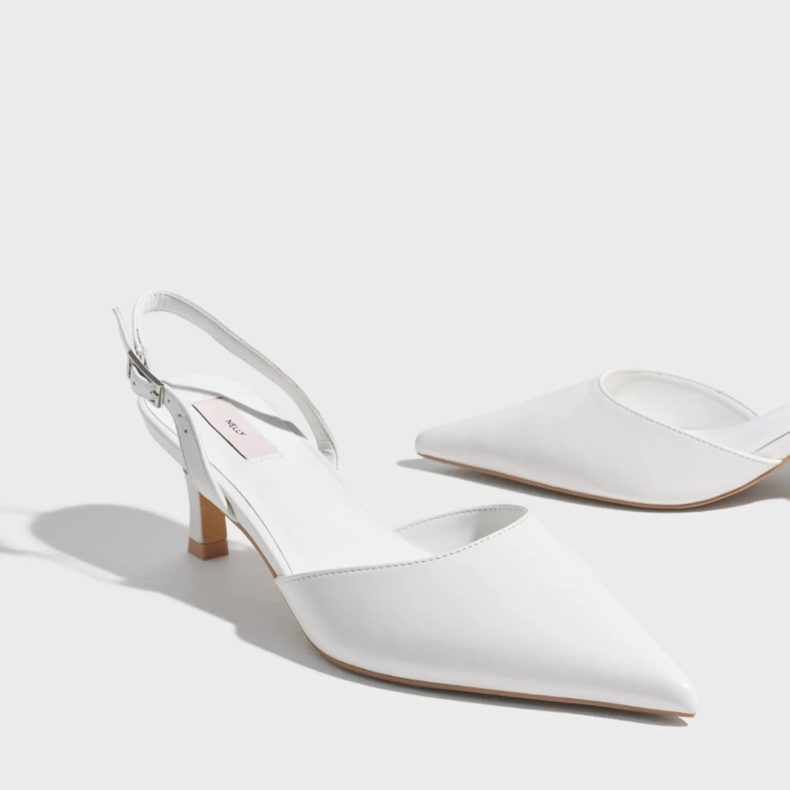 Vita pumps från Nelly strl 38 - 90