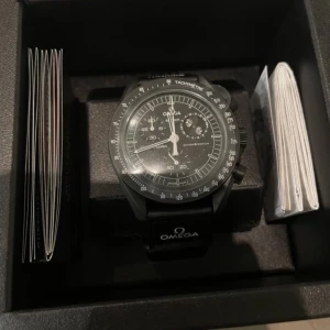 omega swatch snoopy - helt ny. kvitto finns. snoopy modellen. pris kan diskuteras  
