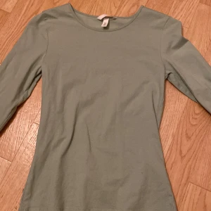 Lång armad pastel grön tröja  - Fint sick, helt oanvänd 