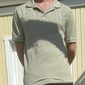 Piké i storlek M  - H&M piké tröja i storlek M 