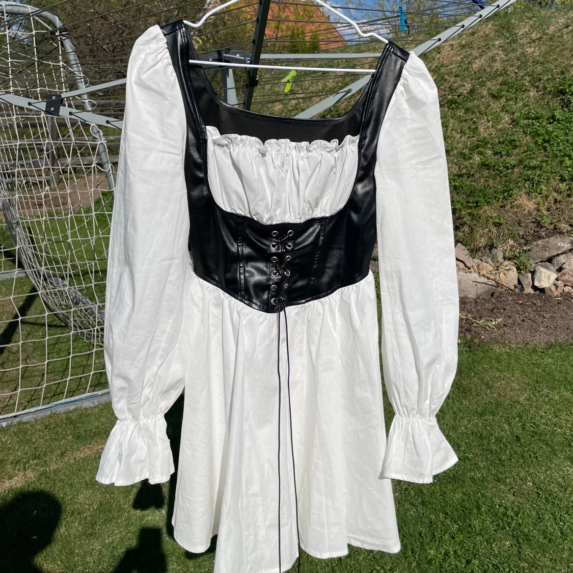 Vit klänning med korset 