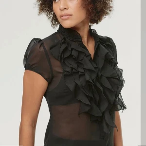 Svart genomskinlig blus - Svart genomskinlig blus i bra skick