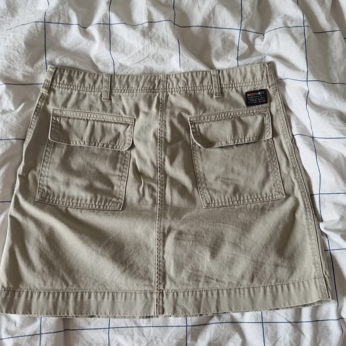 Beige kjol från M52 Pants - 90