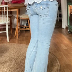 Low waisted bootcut jeans - true religion jeans I storlek 27, Passat M/S. 