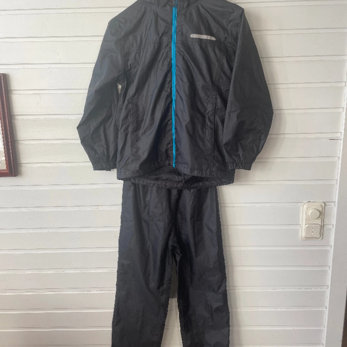 Matchande Regnställ i riktigt bra skick. Storlek 146/152.