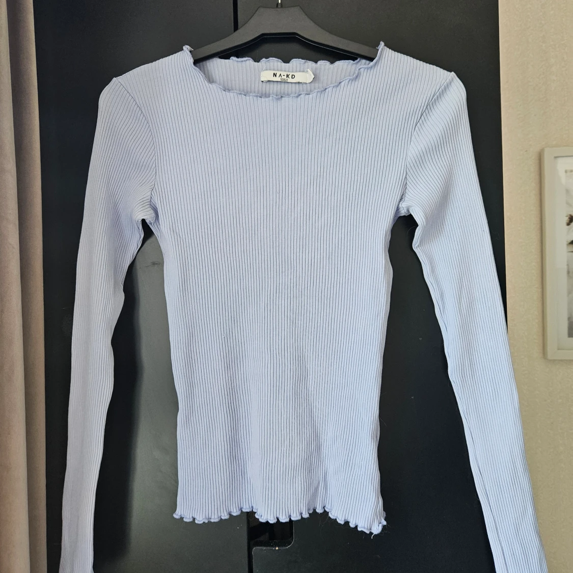 Ljusblå ribbad tröja