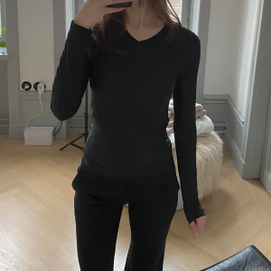 Tränings topp - Fin v ringad tränings topp.