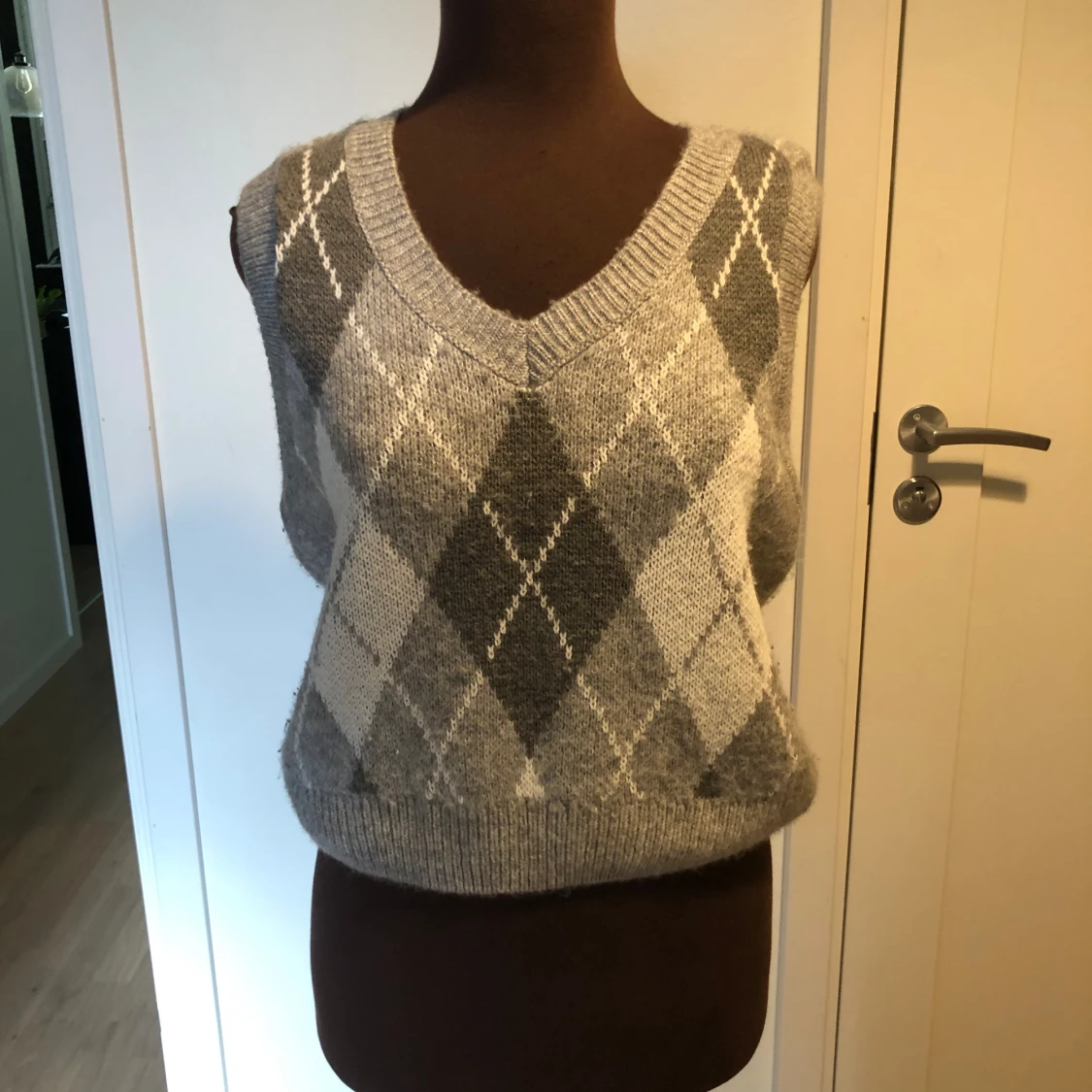 Stickad ullväst - 91