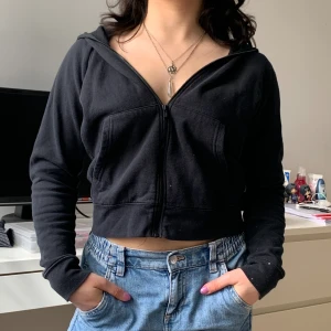 Black zip up hoodie - Cute hoodie but it has some bleach spots on it so I have listed for cheap