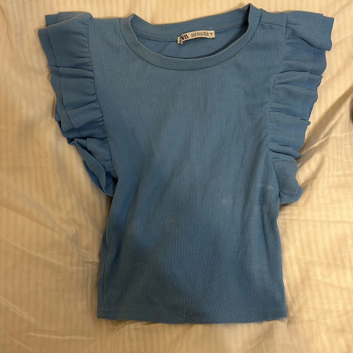 Blå topp med volanger💗 - 90