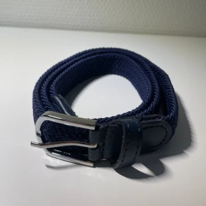 Flätat bälte / skärp - Storlek: 90cm.