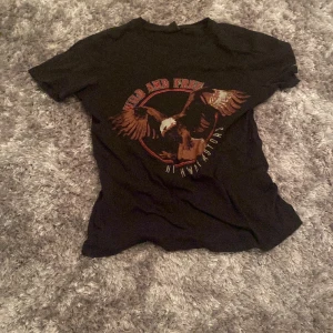 T-Shirt  - Från Gina 