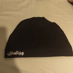 Sixties mössa - Sixties mössa svart/grå