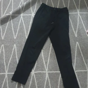 Ett par kostymbyxor - Bra skick nen lite små fläckar 