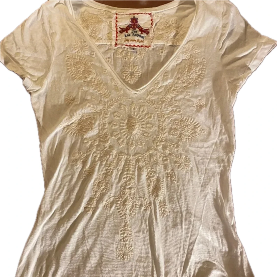 Vit tröja med detaljer