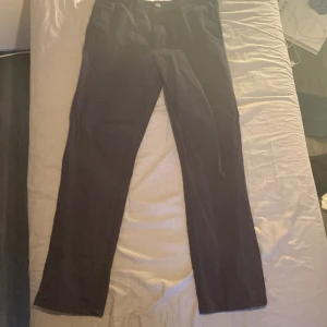 Blåa chinos  - Ett par blåa chinos. Vintage 