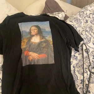 Mona Lisa t shirt - Mona Lisa t shirt storlek m-L