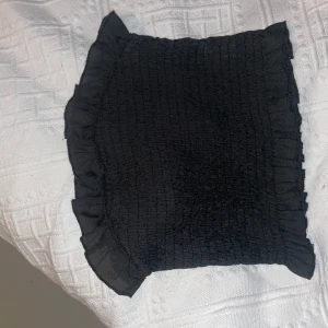 Svart tub-topp  - Aldrig använt, inga fläckar, inget fel